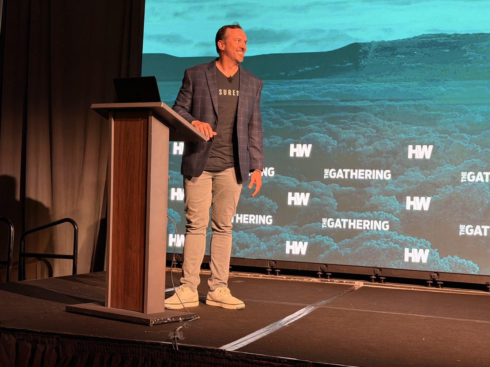 Preston Guyton speaking on stage